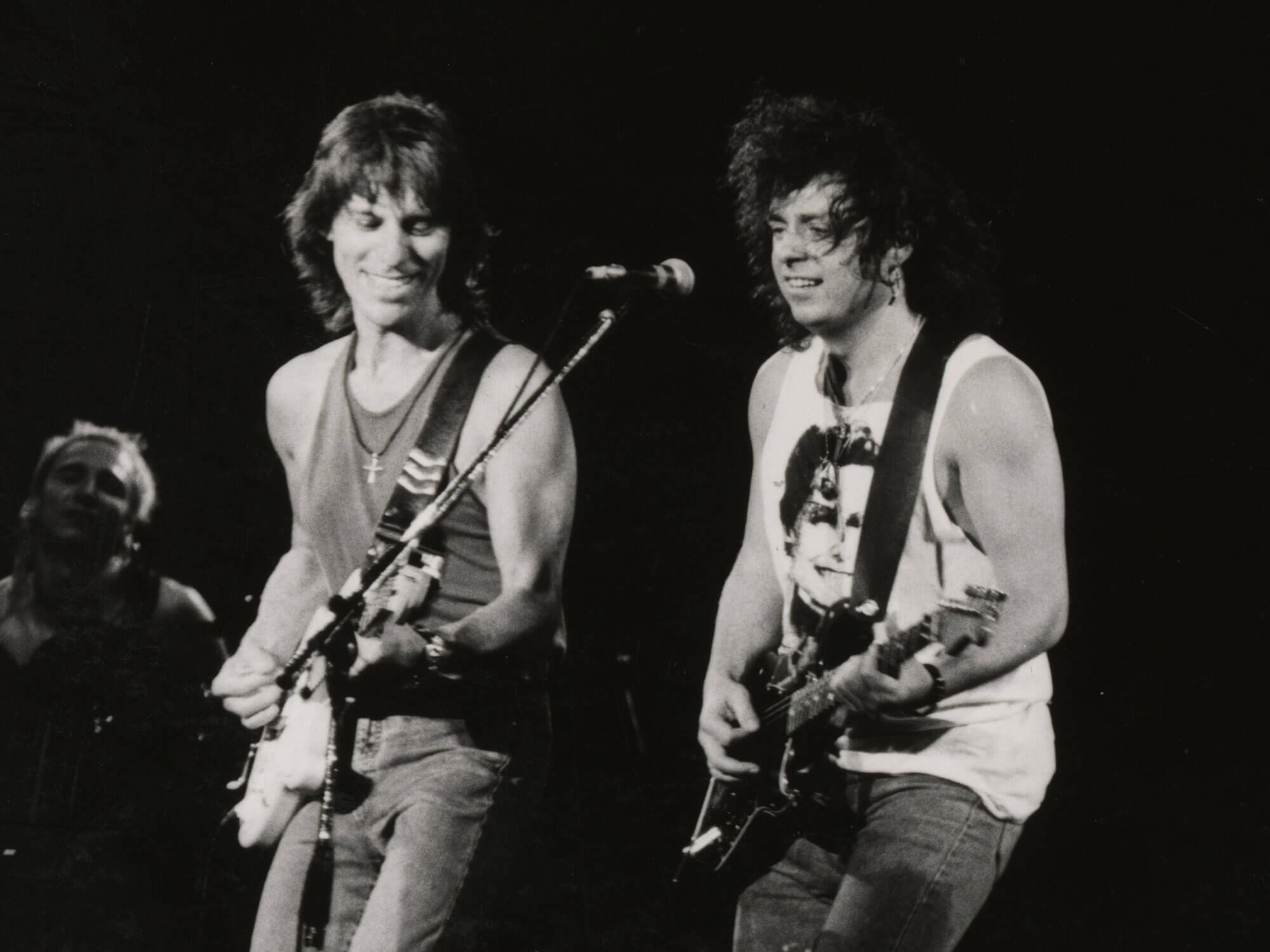 [L-R] Jeff Beck and Steve Lukather playing guitar onstage together